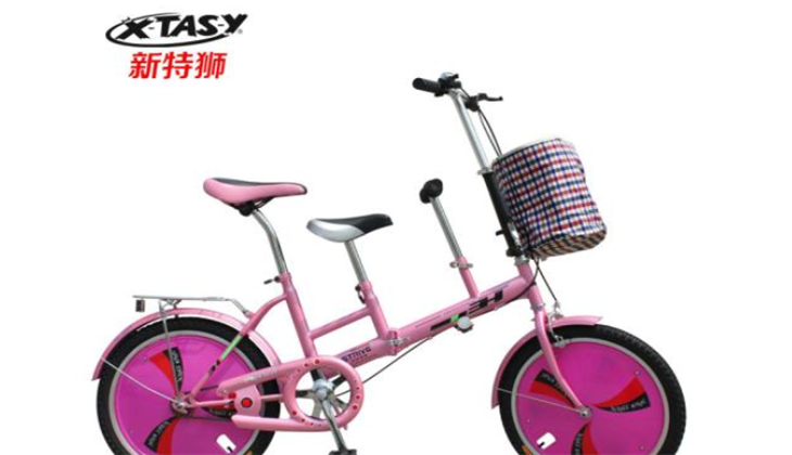 新特狮粉色自行车
